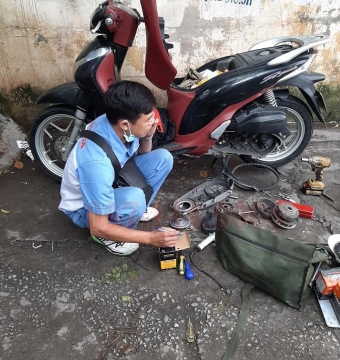 Thợ cứu hộ xe máy tại quận 10